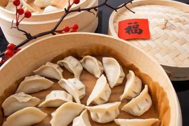 福气满满笼屉蒸饺高清图